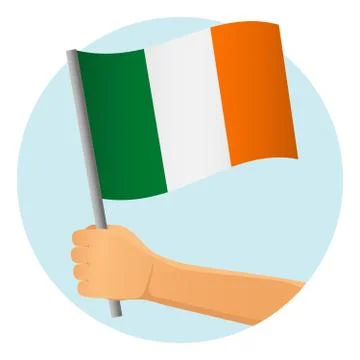 Ireland flag in hand Stock Illustration