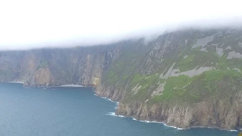 Irelands highest sea cliffs covered in cloud 스톡 동영상 111857072