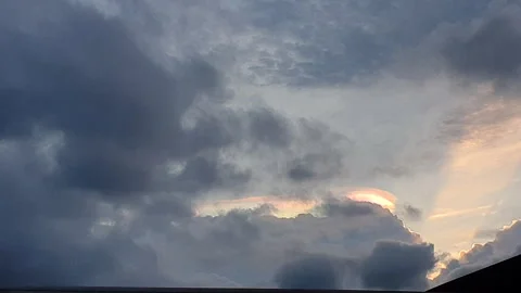 Iridescent cloud rainbow color on cloud natural phenomena Stock Footage 280687239
