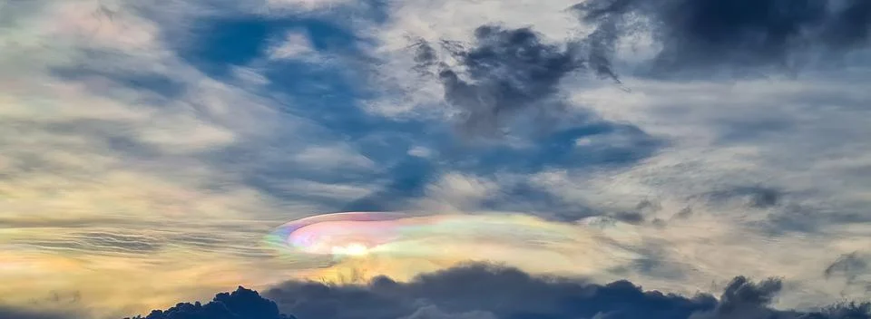 Iridescent cloud  rainbow Stock Photos