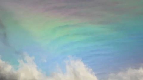 Iridescent cloud in the sky with rainbow colors. Stock Footage 169028686