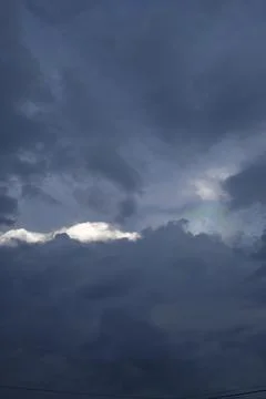 Iridescent clouds, known as fire rainbows or rainbow clouds, occur when sun.. Stock Photos