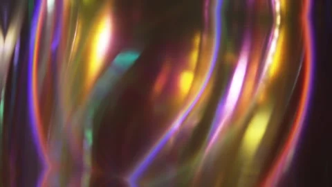 Iridescent diamond facets reflect a spectrum of neon colors, glowing in a 스톡 동영상 305823664