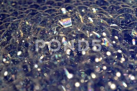 Iridescent foam closeup Stock Photos