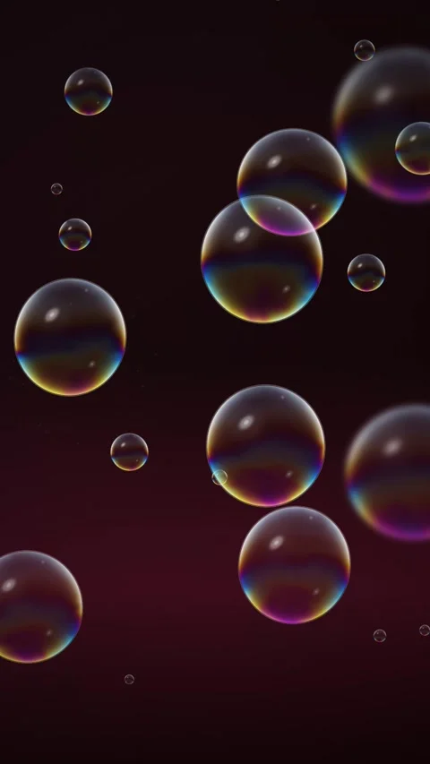 Iridescent Rainbow Bubbles Floating Against Dark Crimson Background Loop Stock Footage 345206819