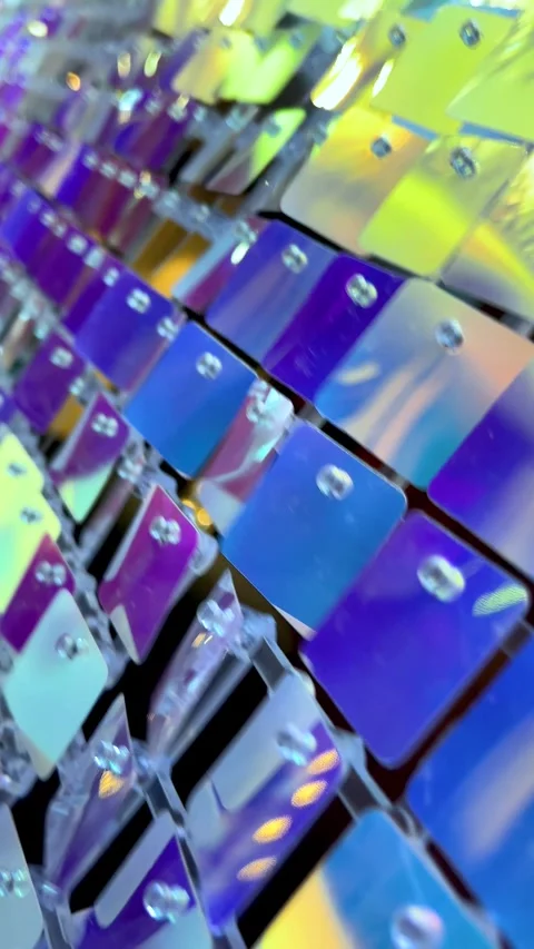 Iridescent sequin wall shimmering with colorful reflections Stock Footage 335706578