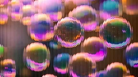 Iridescent soap bubbles floating in the air Stock Footage 320255061