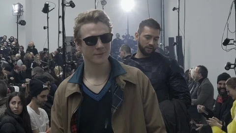 Irish actor Patrick Gibson posing during Lanvin show at Paris Men's Stock Footage 97231332