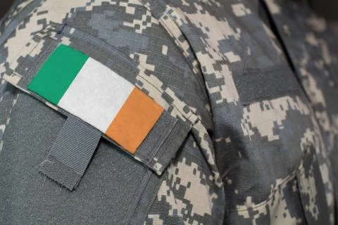 Irish army uniform patch flag on soldiers arm. Military Concept Stock Illustration