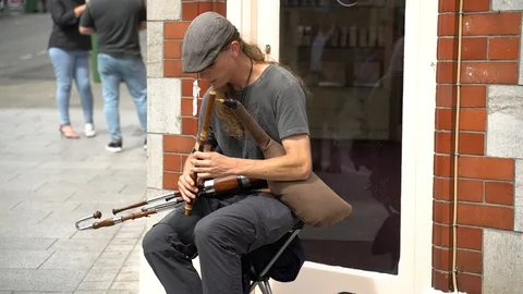 Irish Bagpipe player Stock Footage 127579988