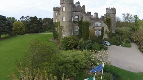 Irish castle &amp; Flags Crane Shot Stock Footage 39243375