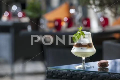An Irish Coffee Cocktail On A Patio Table (Buddha-Bar Hotel, Paris)