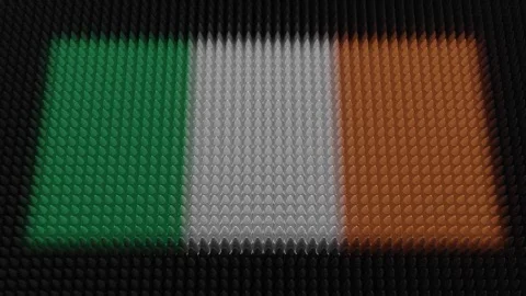 Irish Flag Light Shining on Scrolling Bullets Stock Footage 254125297