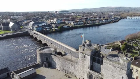Irish flag on top of the castle's tower in Limerick, Ireland Stock Footage