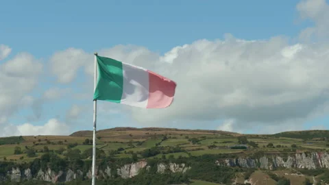 Irish flag under a blue sky Stock Footage 205470702