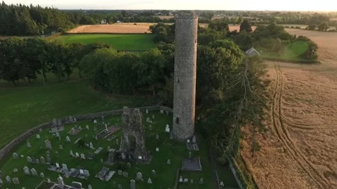 Irish Round Tower, Drone Descent Amazing Sunset, Donaghmore, Navan, Co.Meath, HD Stock Footage 171578258