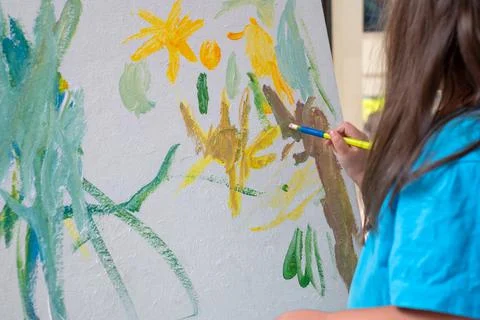 ?irl paints with a brush Stock Photos