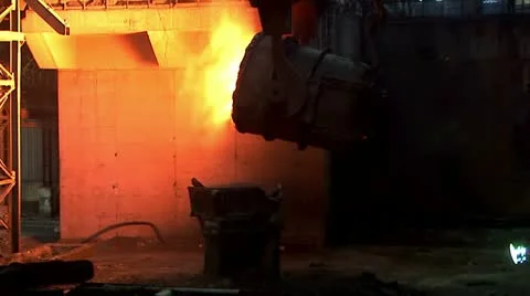 Iron and Steel Works. Pouring of molten iron Stock Footage