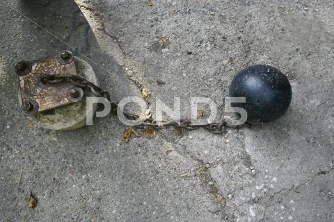 Iron ball with chain and shackle Stock Photos