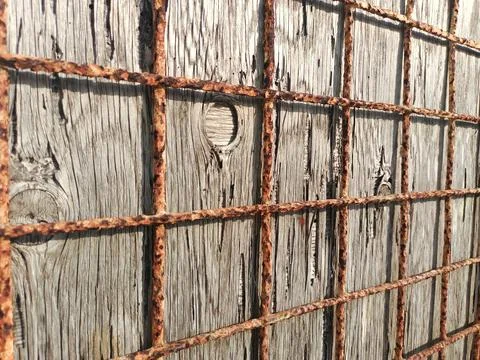 The iron-barred windows. Stock Photos