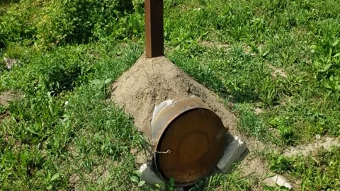 An iron barrel for burning dry grass Stock Footage 311316660