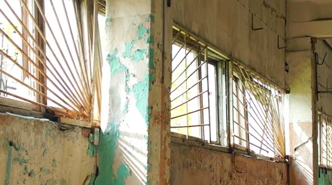 Iron bars on the Windows, in an old ruined building 库存影片 57324070
