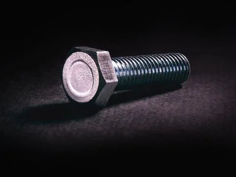 The iron bolt on black background Stock Photos