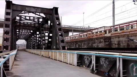Iron Bridge and Fast Train on Railroad Stock-Footage 86212557