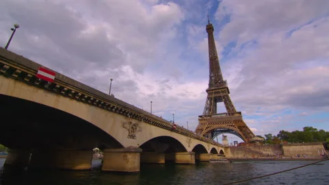 Iron bridge over the river in Paris near the metal tower on which the Paris Stock Footage 204010693