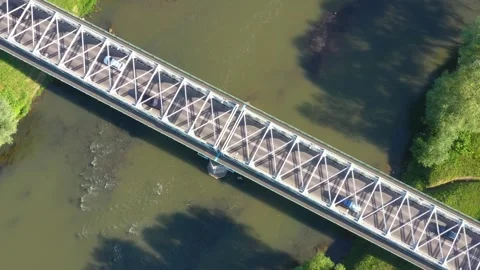 Iron bridge over san river bird view with passing cars Video stock 277708950