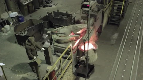 Iron casting with overflowing into container Stock Footage 62083880