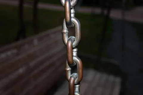 Iron chain from the swing with rust Foto stock