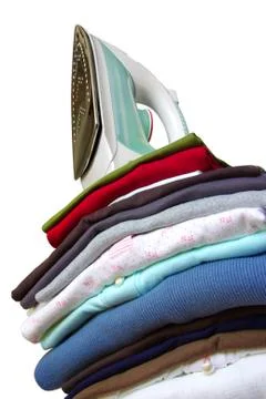 Iron on clothes Stock Photos