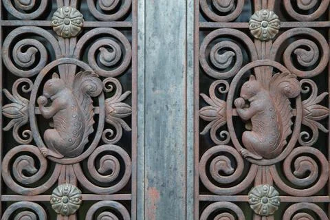 Iron door squirrels Stock Photos