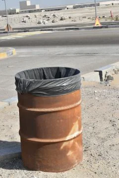 Iron dust bin container in the work site. Stock Photos