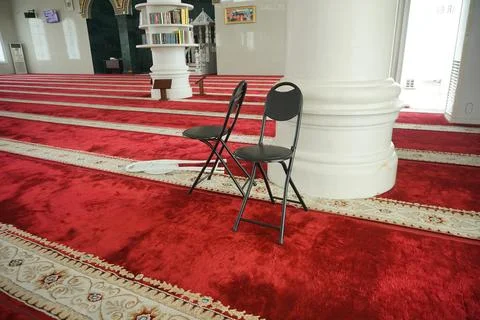 Iron folding chairs in mosques Stock Photos
