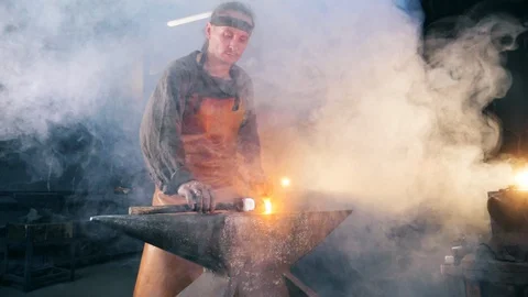 Iron forging process held by the blacksm... | Stock Video | Pond5