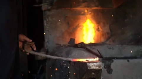 Iron Forging Process At Traditional Blacksmith Workshop Video stock 324567142