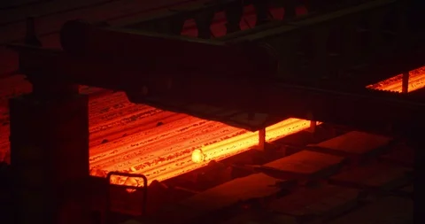 Iron foundry. Continuous casting machine. Steel billet moving through the Stock Footage 125306677