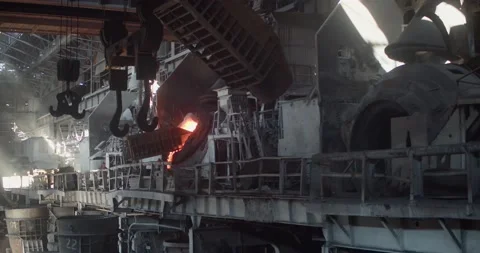 Iron foundry, loading scrap metal into the converter. Stock Footage 172054917