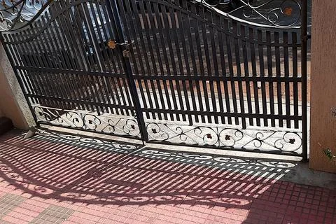 Iron Gate and Its Shadow Stock Photos