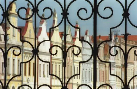 Iron Gate With Building In Background Stock Photos