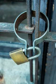Iron gate lock with lock. Stock Photos