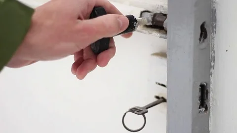 Iron gate opening with a key Stock Footage 71951903