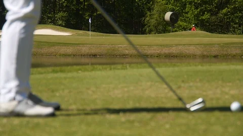 Iron golf shot - practice, setup and swing Stock Footage 99984382