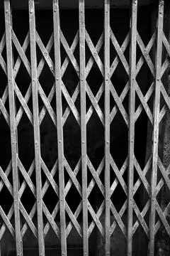 Iron Grate with Crosshatch Pattern in Black and White Photography Stock Photos