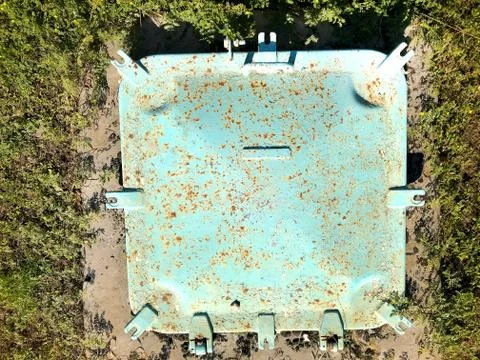 Iron hatch in the ground. Stock Photos