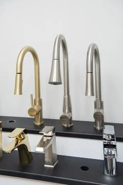 Iron kitchen taps Stock Photos
