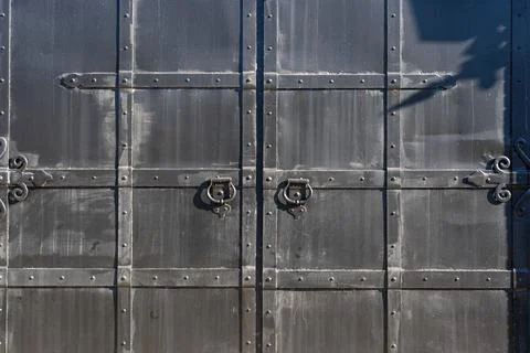 Iron, massive, old gates. Gate background Stock Photos