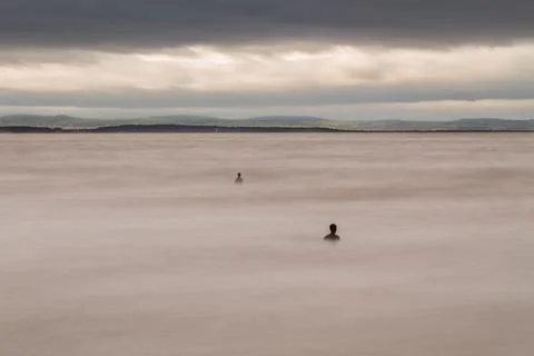 Iron Men pair (landscape) Stock Photos